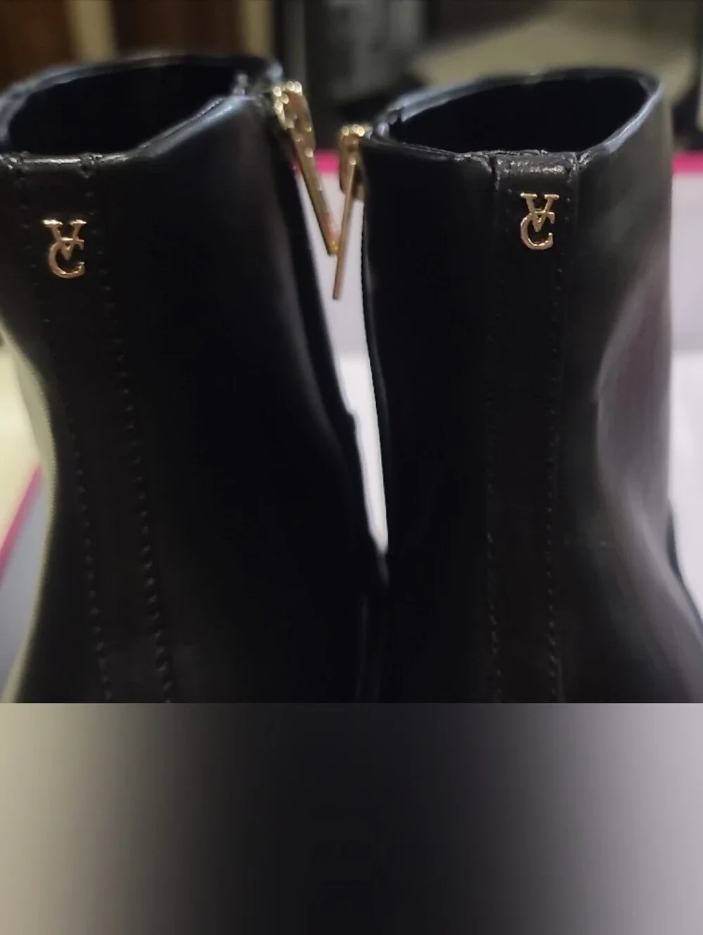 Vince Camuto Black Pointed Toe Ankle Booties with Gold Zipper